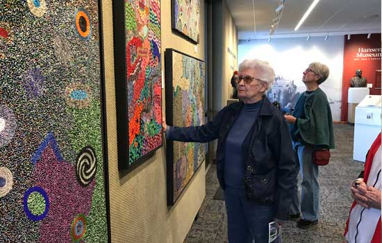 Visitors Enjoying an Art Gallery at Hansen Museum