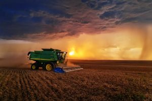 Photo of combine cutting wheat. Photo taken by Thomas Zimmerman